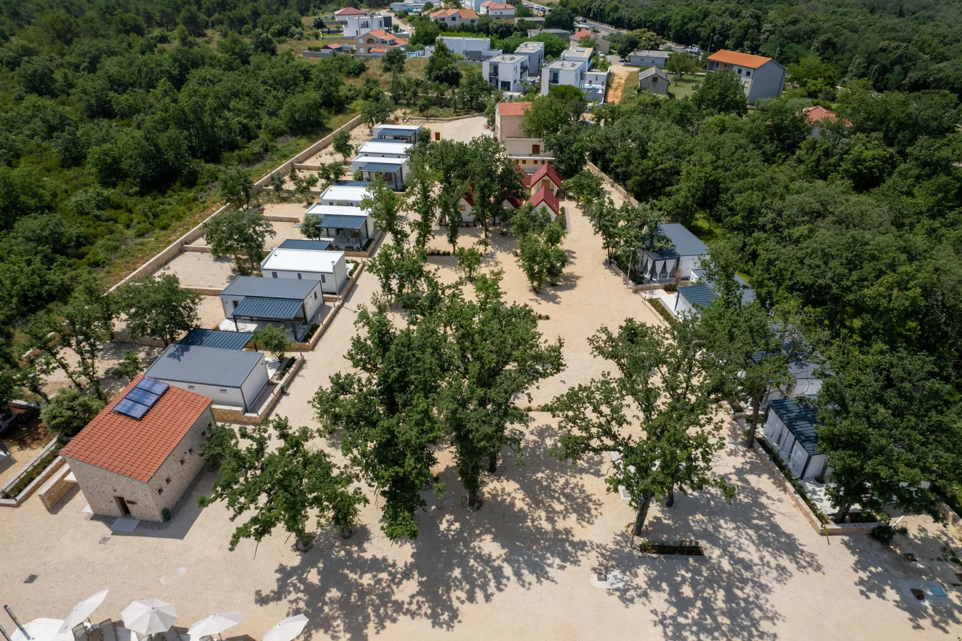 Aerial view of a campground surrounded by trees